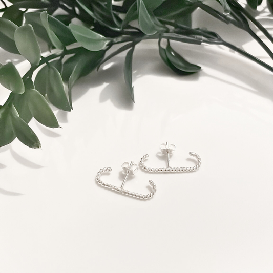 Brinco earhook torcido